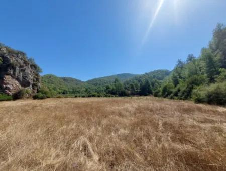 4.427 M2 Fruchtbares Land Mit Blick Auf Die Berge Und Die Natur In Ortaca Okçular Zu Verkaufen