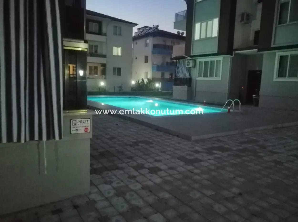 1 1 Furnished Apartment With Pool In Ortaca Bahçelievler For Rent