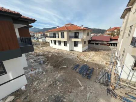 Ortaca Merkeze Yakın Havuzlu Sitede 2+1 Sıfır Arakat Daire Satılık.